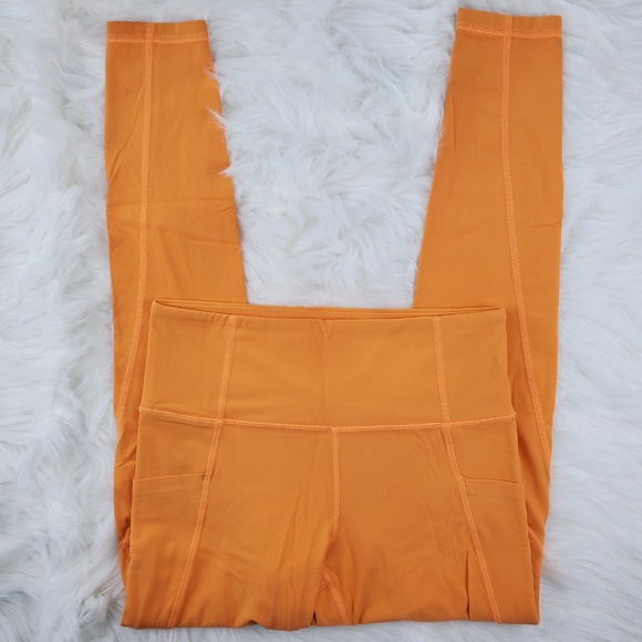 NWOT Athleta Orange Salutation Pocket Leggings - Picture 2 of 6
